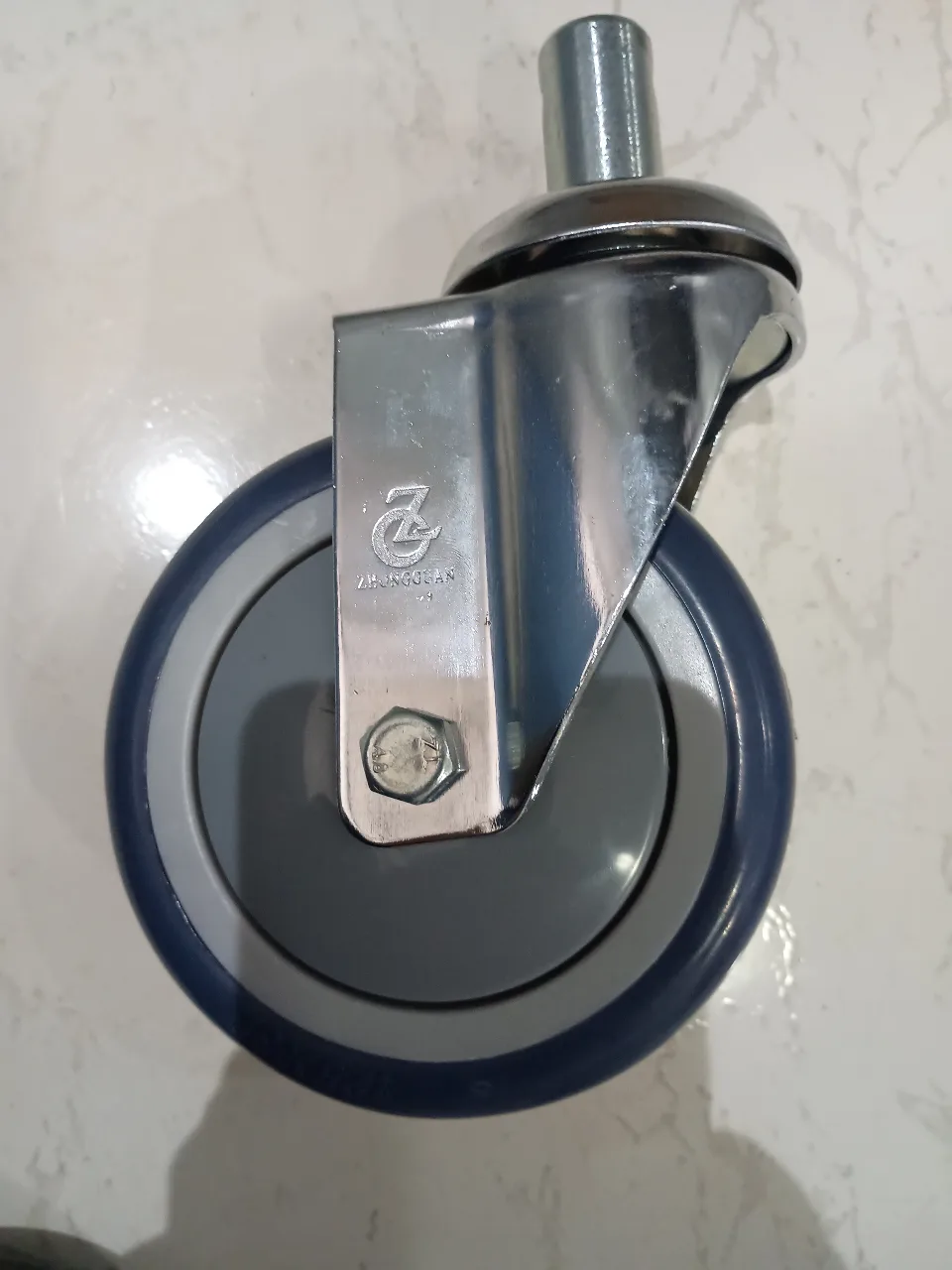 RUEDA MACIZA CON RIN DELANTERA CON TENEDOR 125MM YXH-3B (CAMILLA)